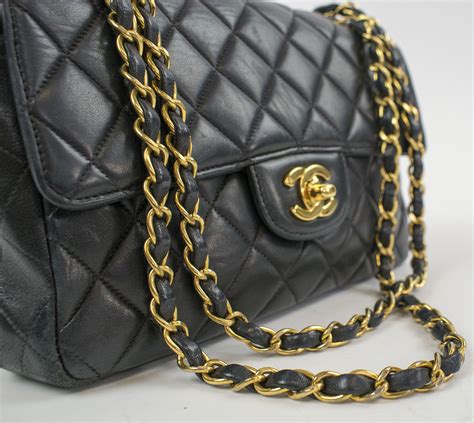 black quilted chanel handbag|chanel black handbag chain strap.